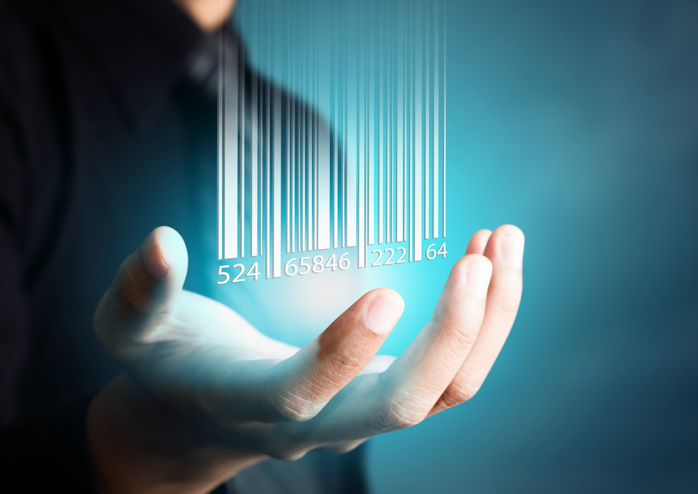 hand with a bar code hovering above representing rf reporting
