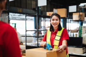 happy woman in shipping department
